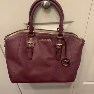Brand New without Tags Plum Satchel. Perfect for winter